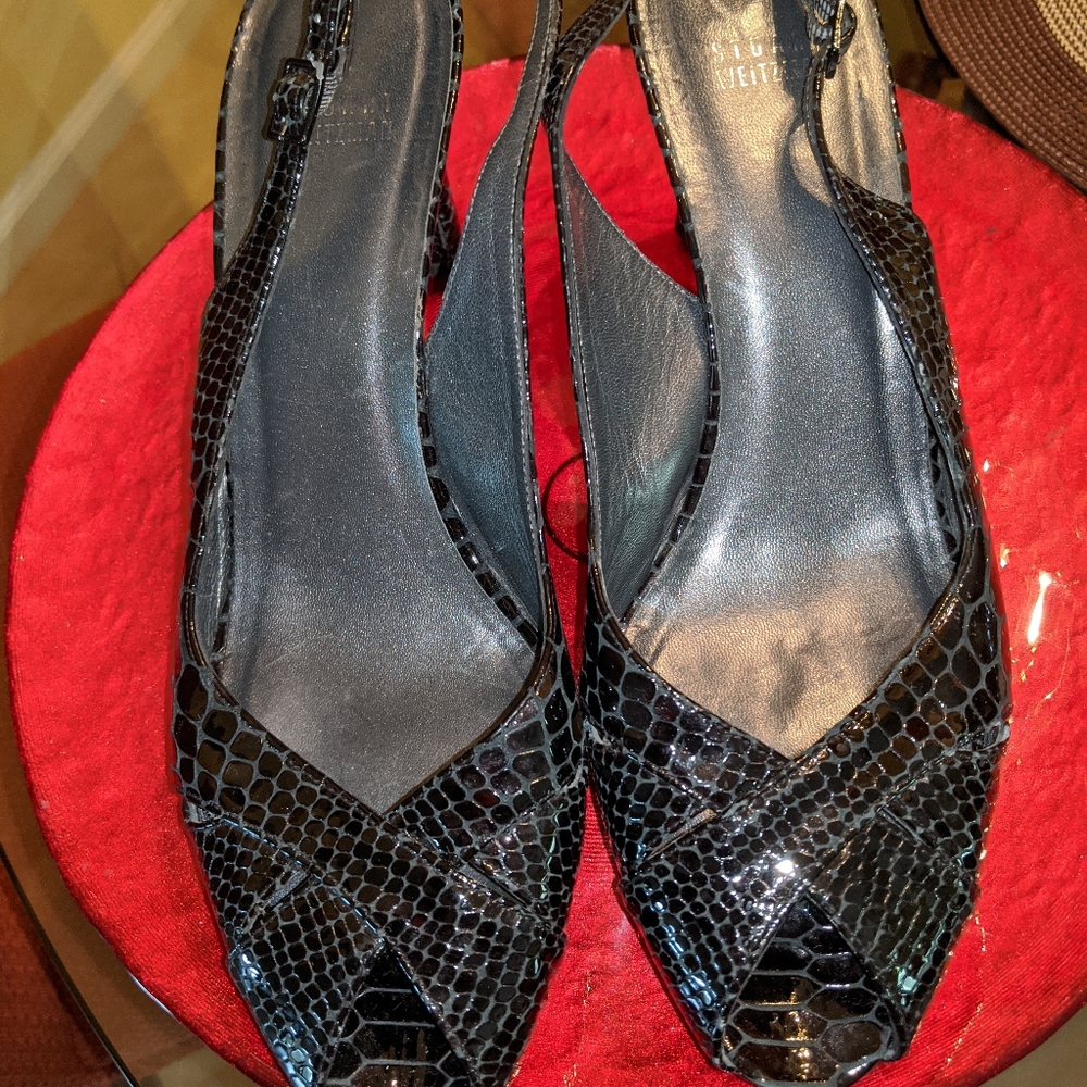 Stuart Weitzman  snake skin, backless 3inch pump .